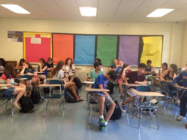 Students sitting in a Spanish class currently taught by a substitute. 