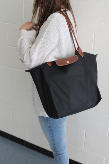 Victoria Vortman is sporting a longchamp bag which she bought on 5th in New York City. She says  Its a simple everyday fall bag and the colors match with everything. 