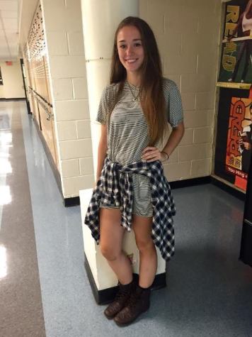 Bailey Bitetto looks great in this simple, laid-back flannel but completely ups her look with the signature Steve Madden combat boots and the Brandy Melville t-shirt dress. Her long, straight hair also adds a nice touch and makes the outfit look effortless and cute. Not to mention, she mixed it up with combining stripes and plaid and she made it happen!! 