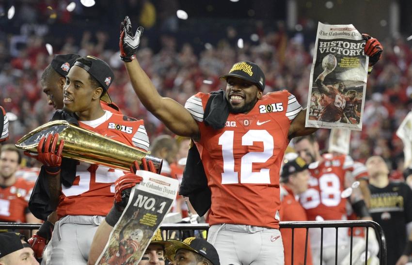 Ohio State CB Grant Doran (number 12) and WR Corey Smith (number 84) celebrating their well deserved win.