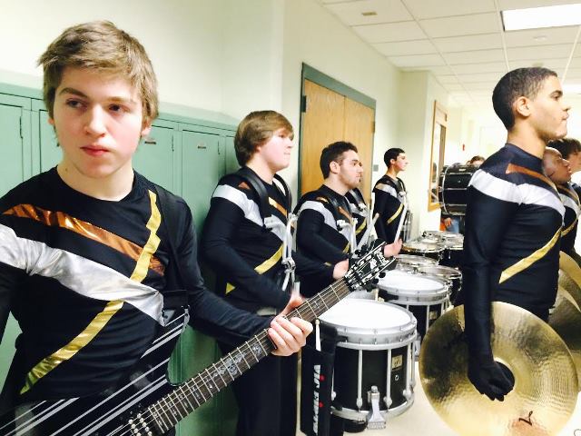 SHS Winter Percussion members warm up before showtime. 