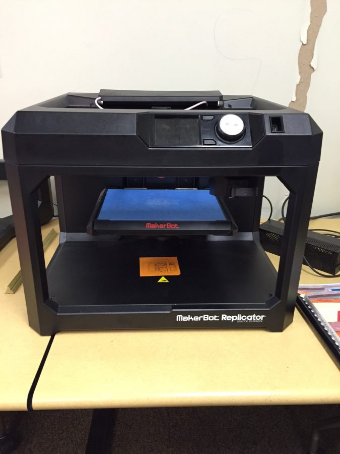 Shown above is the Maker Bot 3D printer machine in the displayed in the media center