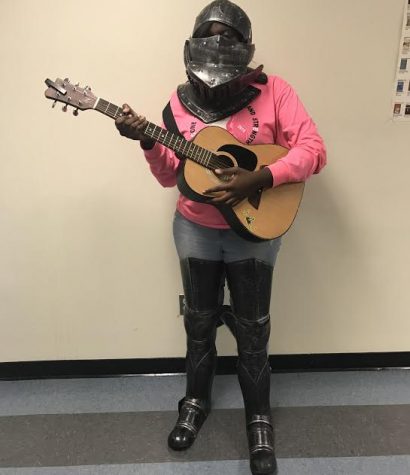 Junior Amani Nasheed models a knight costume (Reminder: masks and/or head coverings are not permitted in school on Halloween)