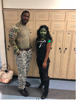Senior Demonie Bailey dressed up as Gamora from Guardians of the Galaxy, with security guard Wendell Christian dressed up as an Army soldier