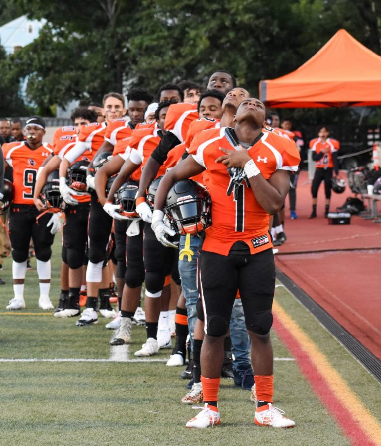 Stamford Football Team during the National Anthem. 