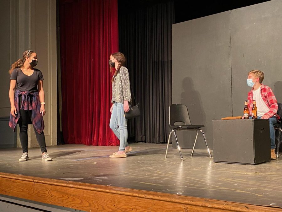 Cooper+Toland%2C+Jasmine+Whitfield+and+Leo+Field+perform+their+scene+in+the+SHS+auditorium.