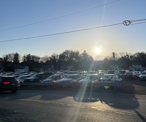 The Stamford High parking lot in the morning. A student survey investigated the frequency of skipping class at SHS and whether students go to the parking lot when they skip.